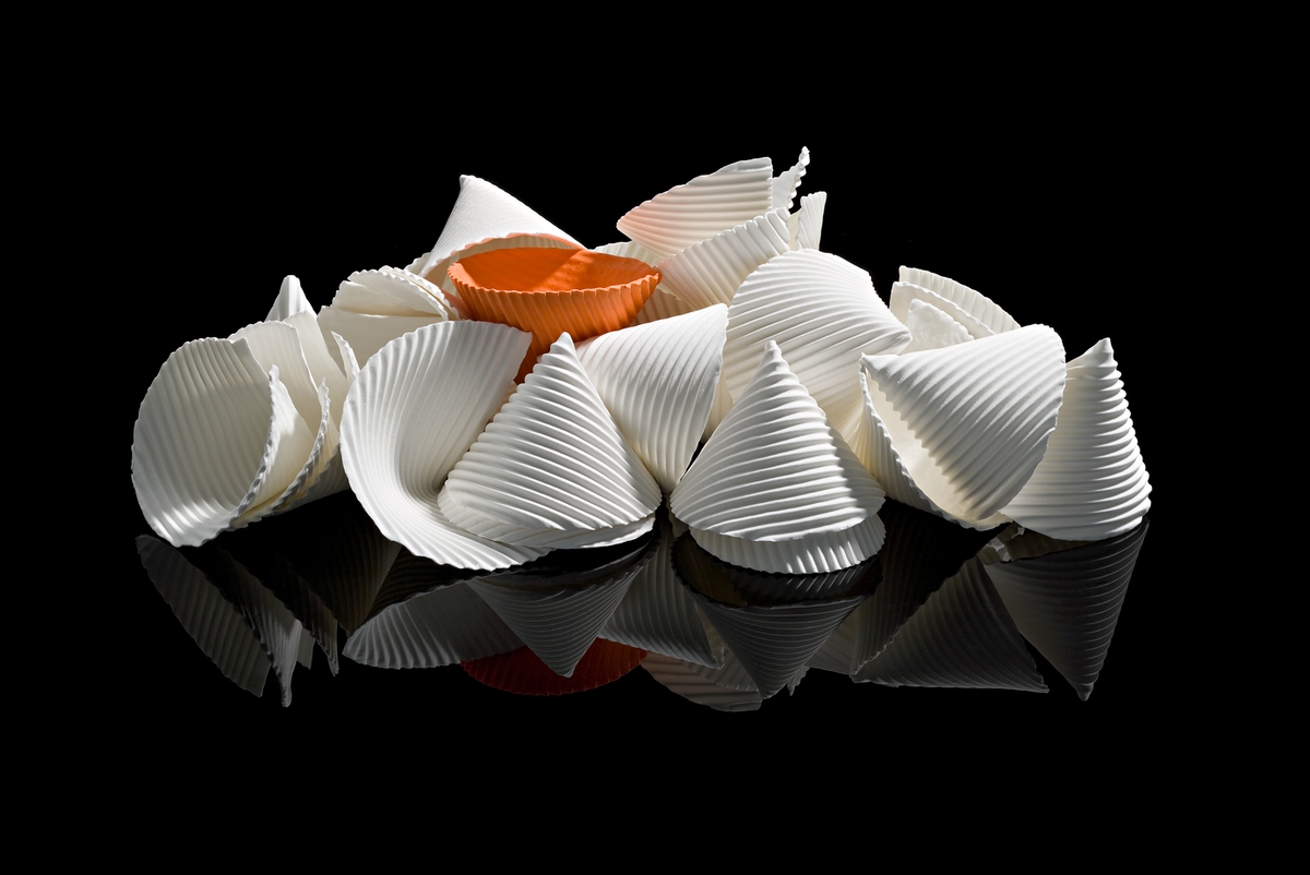 Titania Henderson, Piled Up 1 Orange, 2014, bone china, 25.0 x 52.0 x 38.0 cm variable.