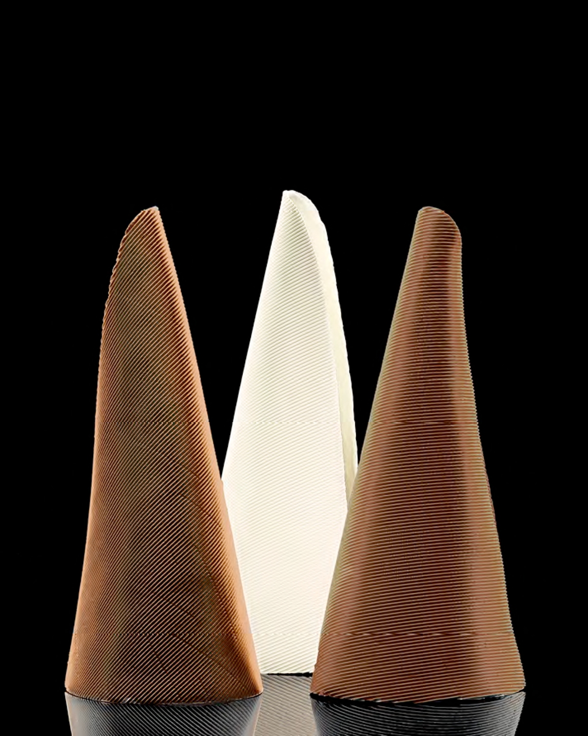 Titania Henderson, Untitled (Cones), 2016, bronze, 3 pieces, 38.0 x 24.0 x 12.0 cm overall, private collection.