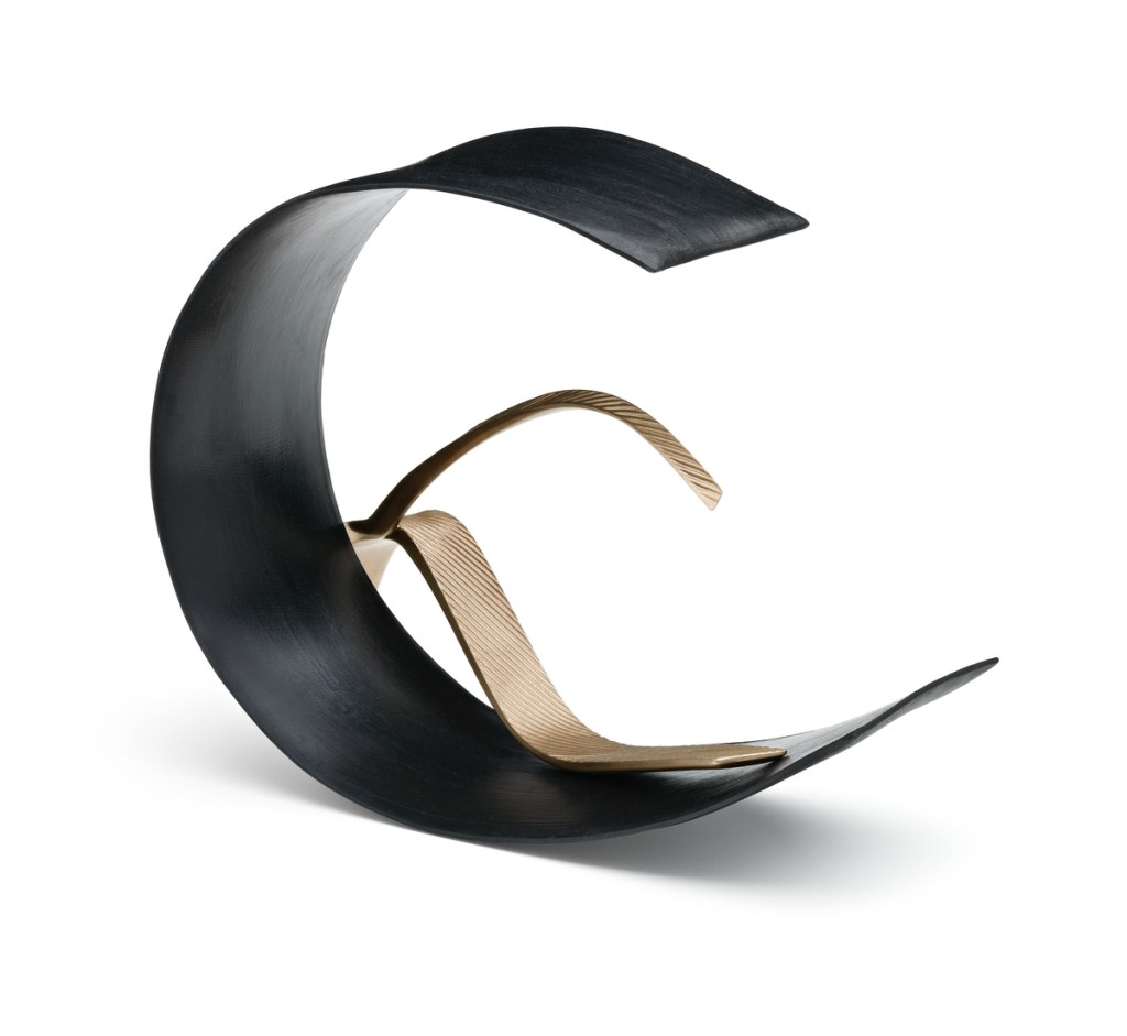 Titania Henderson, Untitled (Waves), 2016, black French Limoges porcelain and bronze maquette, outer form 22.0 x 26.0 x 10.0 cm. inner form 13.0 x 27.0 x 3.0 cm.