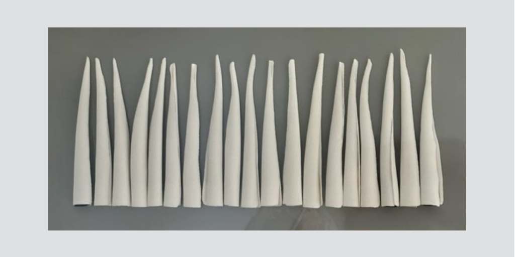 Titania Henderson, Together III, 2014, bone china porcelain and perspex box, 50.0 x 85.0 x 8.0 cm